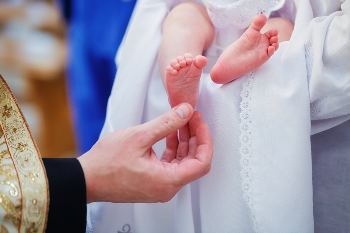 Priest Christening Newborn 